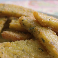 Baked healthy polenta chips with lemon and rosemary