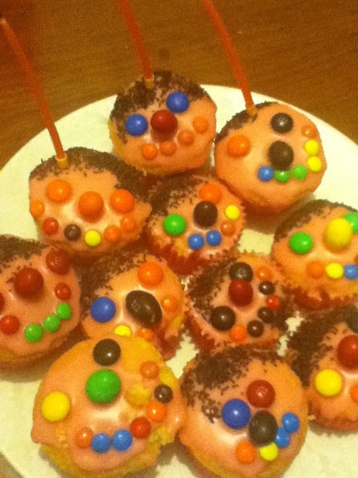 Cupcake faces with orange icing