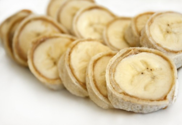 Little banana sushi rolls made with tortillas, peanut butter and banana inside