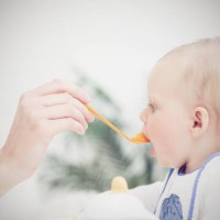 Giving Baby Solid Food Early Won’t Help Them Sleep Better Despite What Research Says