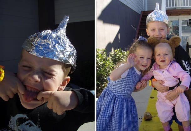 Young boy with 'tinman' hat made out of tin foil