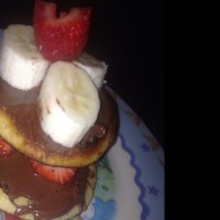 Pikelets with Nutella, bananas and strawberries