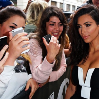 Kim Kardashian wants how many kids?