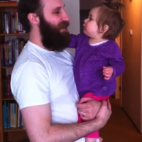 This little girl misses her Daddy's beard