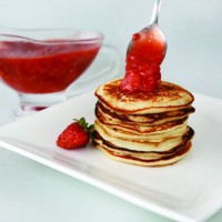 Buttermilk pancakes with strawberry sauce