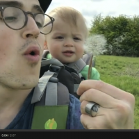 Too cute: Watch how amusing dandelions are to this little guy!