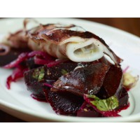 Calamari Cooked in Olive Oil with a spiced beetroot salad.