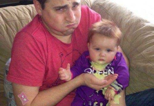 When good kids do bad things_baby vomiting into daddys hand_585x402