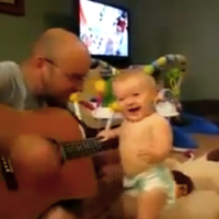 Adorable baby dancing to dads guitar