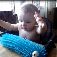 Baby reacts to rubber worm toy, his reaction is priceless!