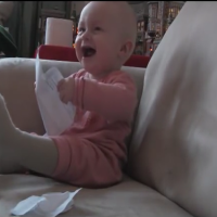 Baby Laughing hysterically at paper, so funny!