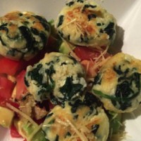 Spinach and ricotta dumplings with tomato salsa