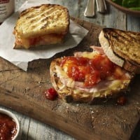 Grilled ham and cheese toastie with tomato chutney