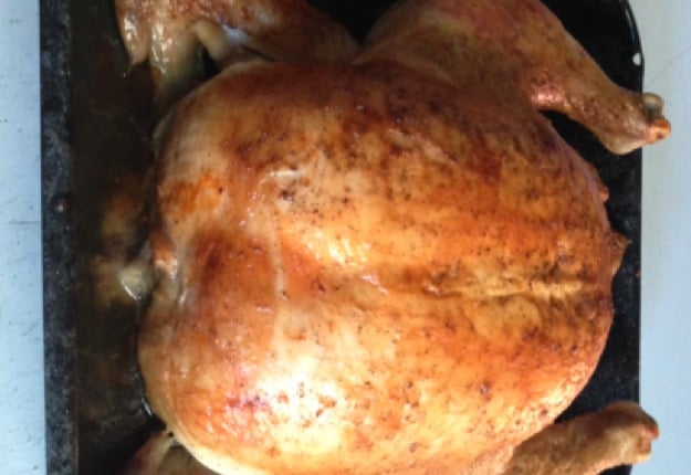 Traditional Christmas roast chicken with thyme and onion stuffing