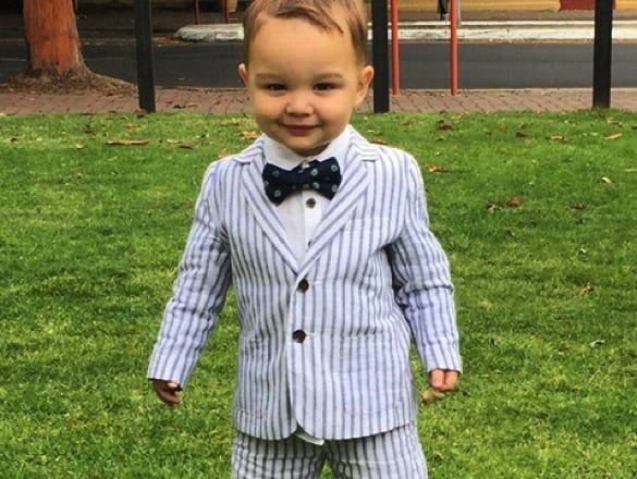 Hudson and Archer Sebastian steal the show at their uncle's wedding_archer looking edgy in a pin striped suit
