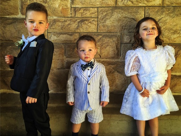 Hudson and Archer Sebastian steal the show at their uncle's wedding_the two boys with their cousin