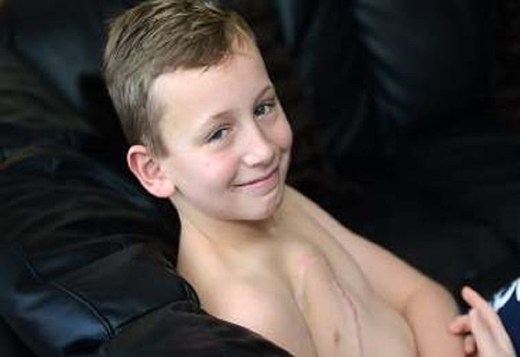 Brave 11 year old boy says his chest scar is "a real pulling machi...