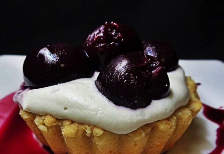 Olive oil tarts with cashew cream and berries