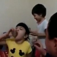 Shocking video: Dad appears to feed vodka shots to his daughters