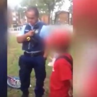Shocking footage has emerged showing a 12-year-old boy abusing police