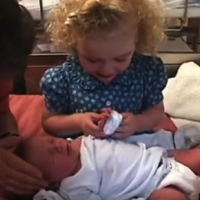 GORGEOUS VIDEO: Little girl calms her newborn sister