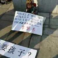Man tried to give his son away on a busy street in China