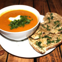 Rustic carrot and coriander soup with crispy pitta