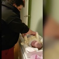 WATCH: Video shows dad dry retching as he attempts to change his baby