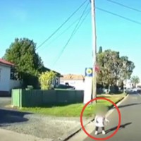 VIDEO of the moment a toddler is almost hit by a car