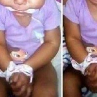 Pictures of baby girl gagged and tied were a joke