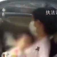 VIDEO: Mother caught driving while BREASTFEEDING