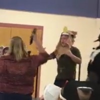 Internet angered after teacher snatched microphone from autistic boy