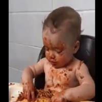 Video: Baby trying hard to stay awake for dinner