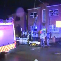Boy thrown from window to escape fire