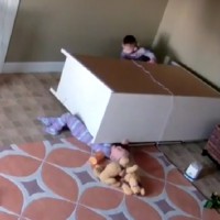 WATCH: The moment a toddler saves his twin brothers life