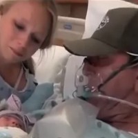 Dying dad cradles his baby girl as he slipped away