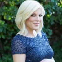 Tori Spelling's bump is nearly ready to pop!