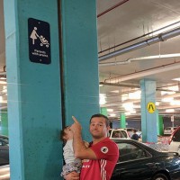 Dad has something to say about parent parking bay signs