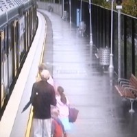 Terrifying moment a child slips between a train and the platform