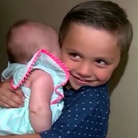 Neighbour Shocked To Find 5-year-old Alone Holding His Baby Sister