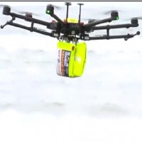 DRONE used to rescue two teenagers from wild surf