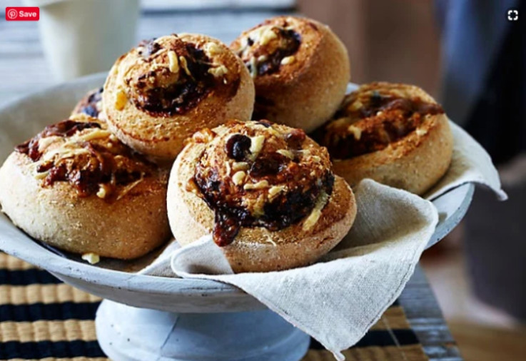 Vegemite Scrolls baked golden brown with cheese on top served in a deep bowl