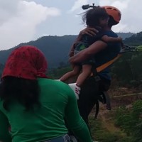 Dad Bungee Jumps While Holding Toddler