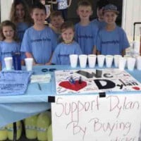 Young Boy Raises Thousands of Dollars to Help Sick Baby Brother