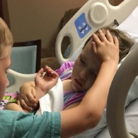 Heartbreaking Photo Shows Big Brother Comforting Little Sis Before She Died