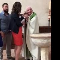 The Priest Filmed Slapping a Young Baby Has Been Identified and Suspended