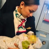 Air Hostess Goes VIRAL For Feeding Passengers Baby