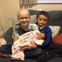 Young Boy Fights Against Cancer Diagnoses to Meet Baby Sister