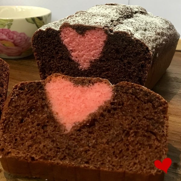 Chocolate Bar Cake with pink heart cake inside - slice the cake to reveal the hidden heart!