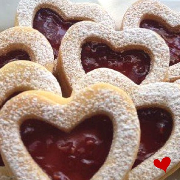 Sweet Heart Cookies - heart shaped cookies filled with raspberry jam and dusted with icing sugar